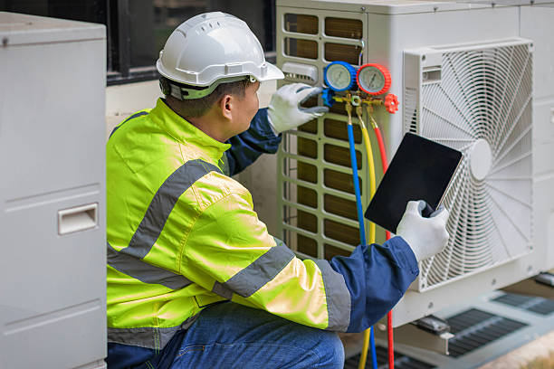 Professional Heat Pump Repair technician working in Holland Patent, NY